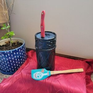 Ceramic Knife or utensil holder with removable insert.